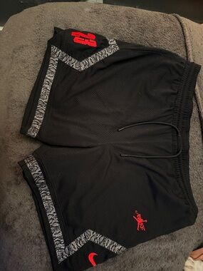 Awake Black Mesh Athletic Shorts with Red Logos